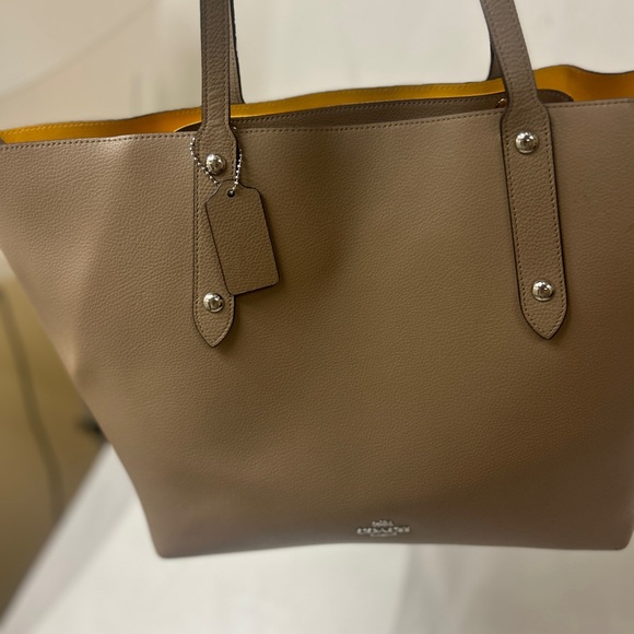 Coach Handbags - Coach Pebbled Leather Tote in Beige